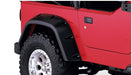 Bushwacker 97-06 jeep tj max pocket style flares - red jeep with black tire cover