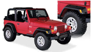 Red jeep tj with black pocket style fender flares and white wheels
