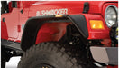 Red jeep wrangler with bushwacker flat style flares