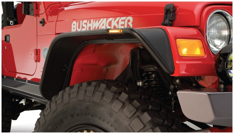 Red jeep wrangler with bushwacker flat style flares