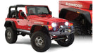 Red jeep with black bumper showcased against a white background - bushwacker flat style fender flares for 97-06 jeep wrangler