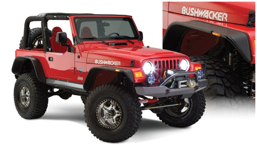 Red jeep with black bumper showcased against a white background - bushwacker flat style fender flares for 97-06 jeep wrangler