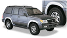 Gray suv with black tire cover featuring bushwacker 98-07 toyota land cruiser oe style fender flares - black