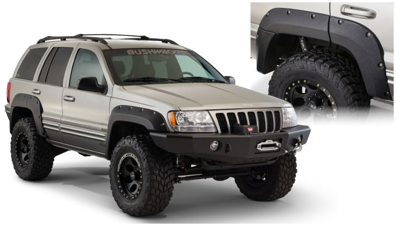 Bushwacker jeep grand cherokee fender flares with large tire on close up jeep