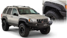 Bushwacker 99-04 jeep grand cherokee cutout style flares with large tire on jeep - black