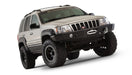 Bushwacker 99-04 jeep grand cherokee cutout style flares with big tire on white background