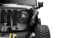 Bushwacker trail armor fender delete kit displaying a close up of a jeep with a light on and a yellow handle