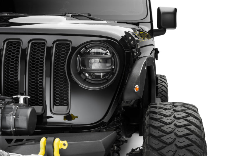 Bushwacker trail armor fender delete kit on jeep wrangler with light