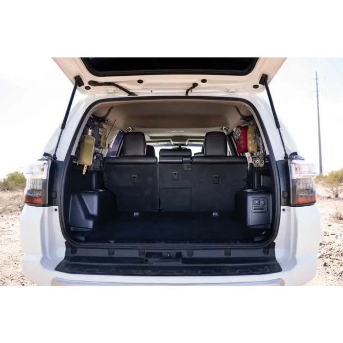 DV8 10-23 Toyota 4Runner Rear Window Molle Panels - White van trunk with open compartment