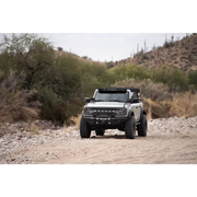 Ford Bronco A-Pillar Pod Light Mounts driving down dirt road.