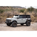 White jeep with black roof and wheels featuring DV8 21-22 Ford Bronco A-Pillar Pod Light Mounts.
