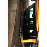 Yellow truck parked in parking lot with DV8 21+ Ford Bronco Curved Light Bracket for 12 3in. Pod Lights.