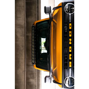 Ford Bronco Curved Light Bracket for 12 3in. Pod Lights - Front end of a yellow truck