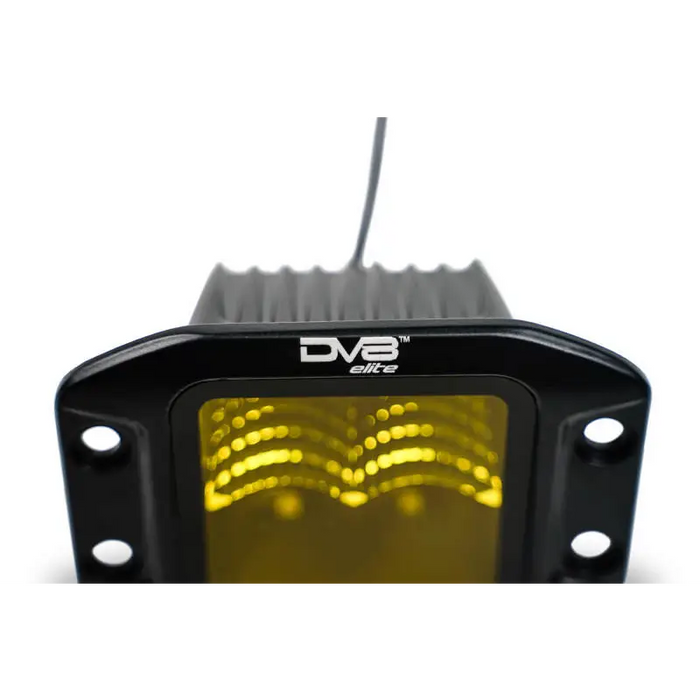 Front view of DV8 3-Inch Elite Series LED Amber Flush Mount Pod Light on Jeep Wrangler with yellow LEDs.