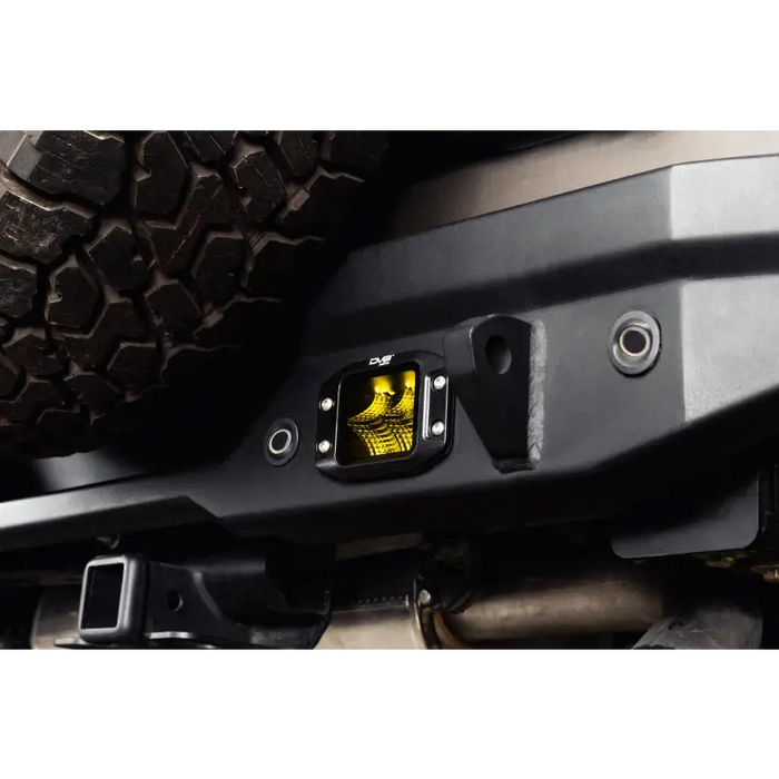 Close up of DV8 3-Inch Elite Series LED Flush Mount Pod Light on Jeep bumper.
