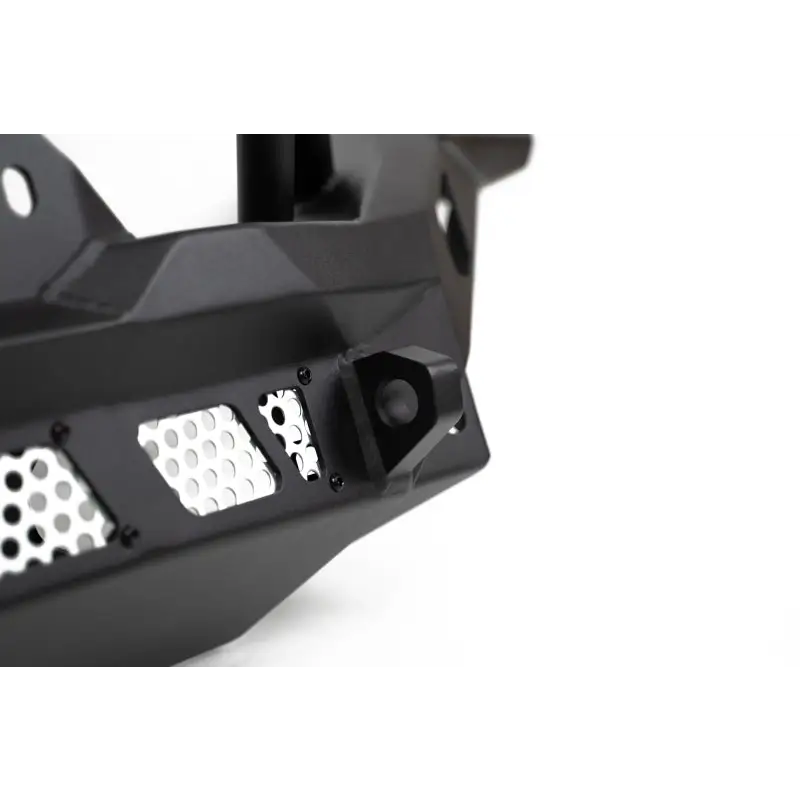 Close up of black dv8 offroad mto series front bumper for jeep wrangler with multiple holes.