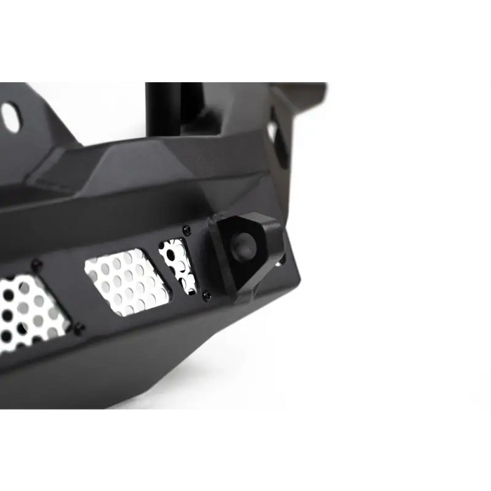 Close up of black dv8 offroad mto series front bumper for jeep wrangler with multiple holes.