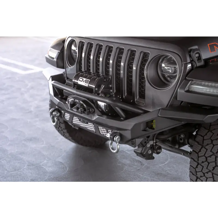 Dv8 offroad mto series jeep wrangler front bumper with black grill and bumper.