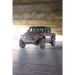 Dv8 offroad mto series front bumper on jeep wrangler parked in garage