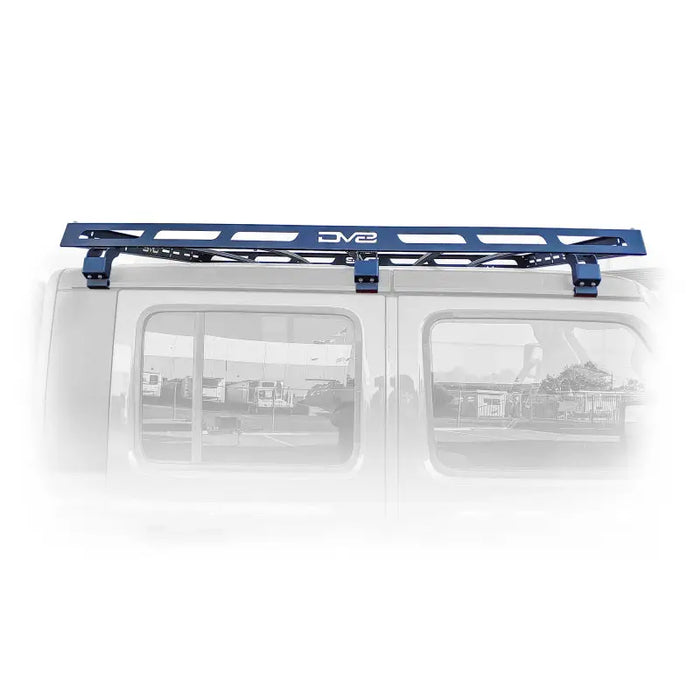 Close up of a van with a blue roof rack from DV8 Offroad Gladiator Roof Rack.