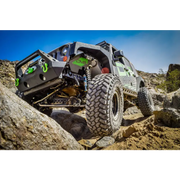 Offroad Jeep Wrangler JK driving rocky trail