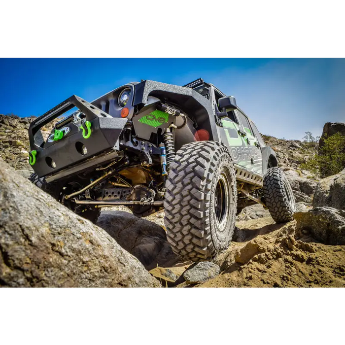 Offroad Jeep Wrangler JK driving rocky trail