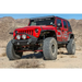 Red Jeep Wrangler JK with rear flat tube fenders by DV8 Offroad