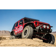 DV8 Offroad 07-18 Jeep Wrangler JK Rear Flat Tube Fenders with Red Paint Job parked in the desert