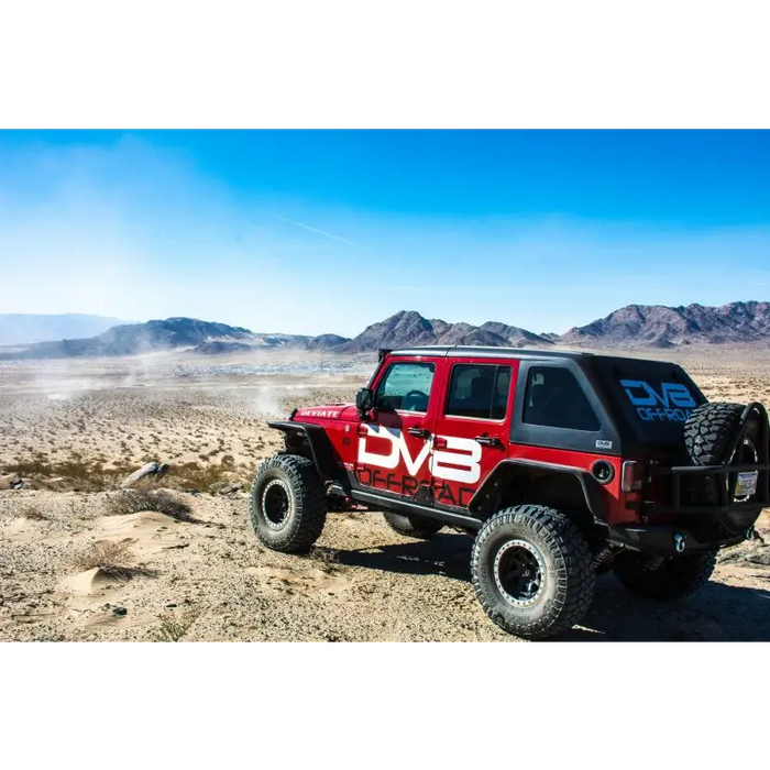 Red Jeep with Black Bumper and White Sticker on DV8 Offroad Flat Tube Fenders