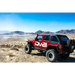 Red Jeep with Black Bumper and White Sticker on DV8 Offroad Flat Tube Fenders