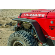 Red Jeep with large tire in desert - DV8 Offroad rear flat tube fenders