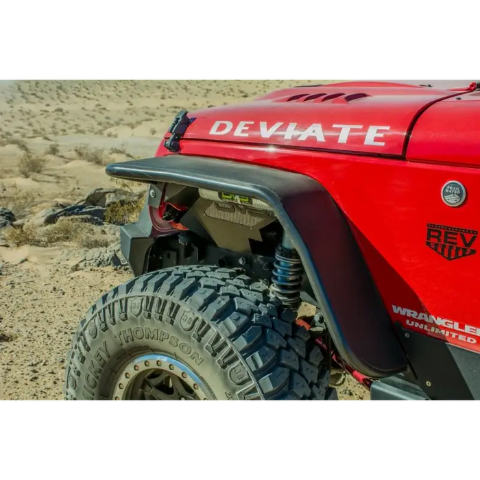 Red Jeep with large tire in desert - DV8 Offroad rear flat tube fenders