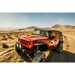 Red Jeep driving on dirt road - DV8 Offroad 07-18 Jeep Wrangler JK Rear Flat Tube Fenders