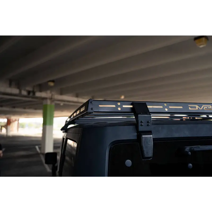 DV8 Offroad full-length roof rack on a Jeep Wrangler JK