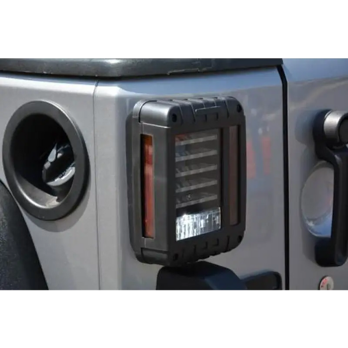 Front bumper mount on Jeep Wrangler JK with DV8 Offroad Horizontal LED Tail Light