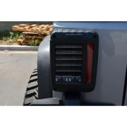 Close up of DV8 Offroad 07-18 Jeep Wrangler JK Horizontal LED Tail Light radio.