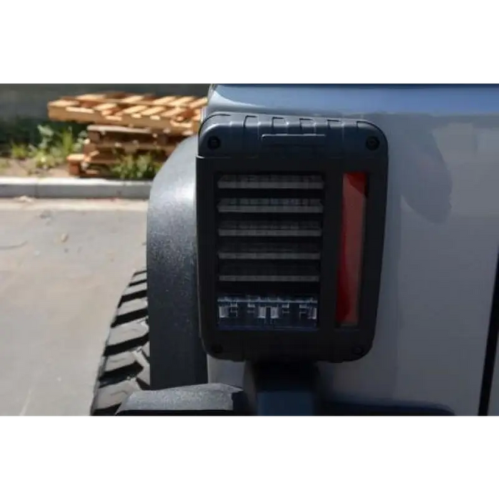 Close up of DV8 Offroad 07-18 Jeep Wrangler JK Horizontal LED Tail Light radio.