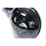 Front view of black and white car with DV8 Offroad LED projector headlights