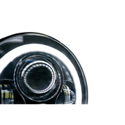 Close-up of DV8 Offroad 07-18 Jeep Wrangler JK LED Projector Headlights with Angel Eyes