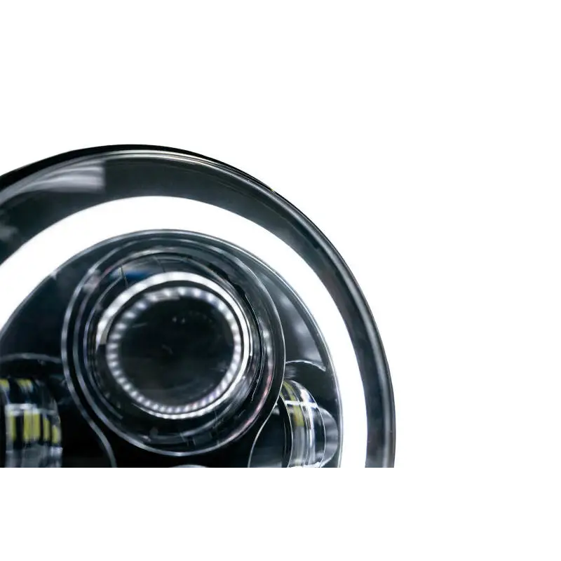 Close-up of DV8 Offroad 07-18 Jeep Wrangler JK LED Projector Headlights with Angel Eyes