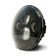 DV8 Offroad black LED projector headlights with white angel eyes.