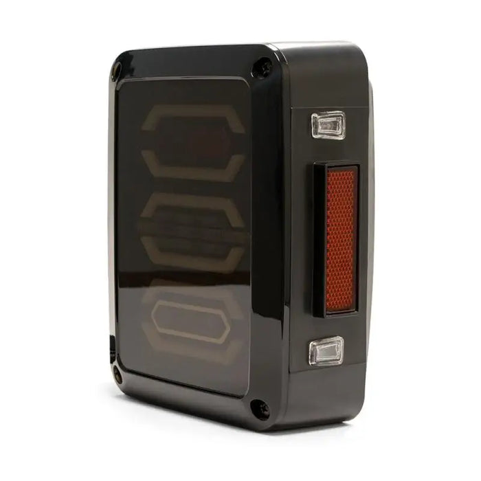 Octagon LED tail light for Jeep Wrangler JK in black and red color.
