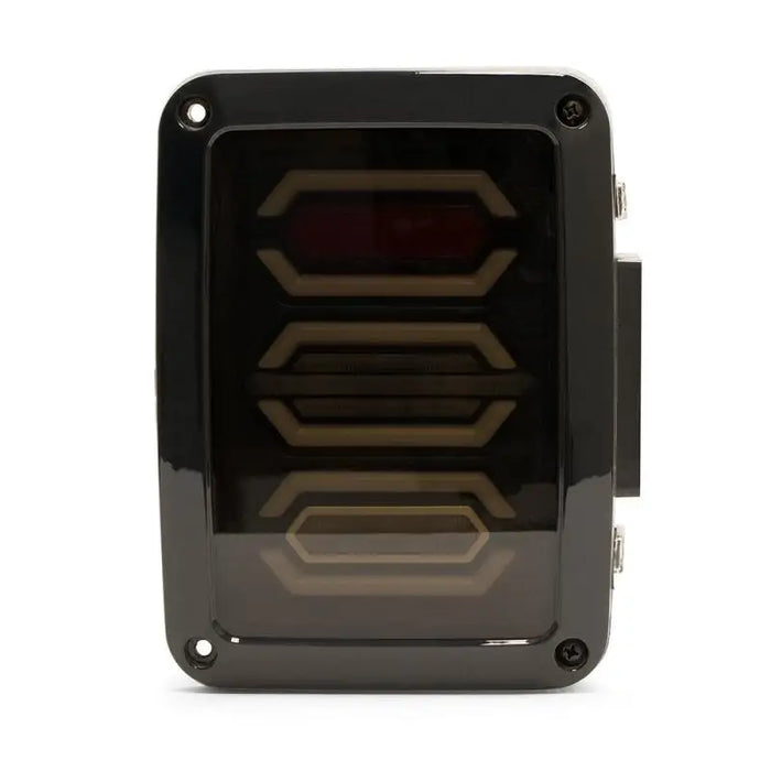 Black plastic case with red LED in DV8 Offroad 07-18 Jeep Wrangler JK Octagon LED Tail Light