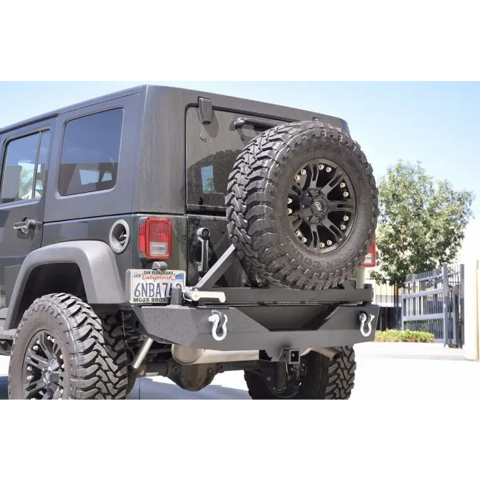 DV8 Offroad Jeep Wrangler JK Rear Bumper with Tire Carrier - Black