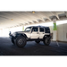 DV8 Offroad Short Roof Rack for Jeep Wrangler JK with white jeep and black wheels