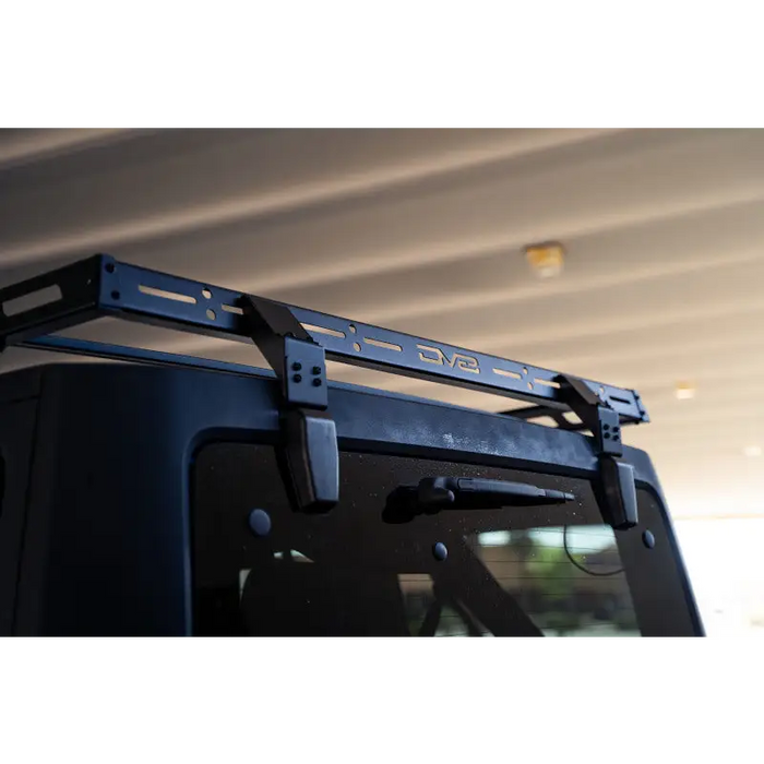 Black Jeep Wrangler JK with Blue Roof Rack - DV8 Offroad Short Roof Rack