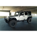 White Jeep with black wheels and slim fender flares on DV8 Offroad product.