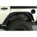 White Jeep with Black Fender Flares and Tire Cover from DV8 Offroad Slim Fender Flares