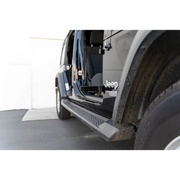 Black truck with open door - DV8 Offroad foot pegs for Jeep Gladiator Wrangler