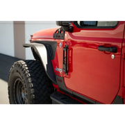 Red Jeep with black bumper and tire in DV8 Offroad 07-23 Jeep Gladiator/Wrangler JT/JK/JL Hinge Mounted Step